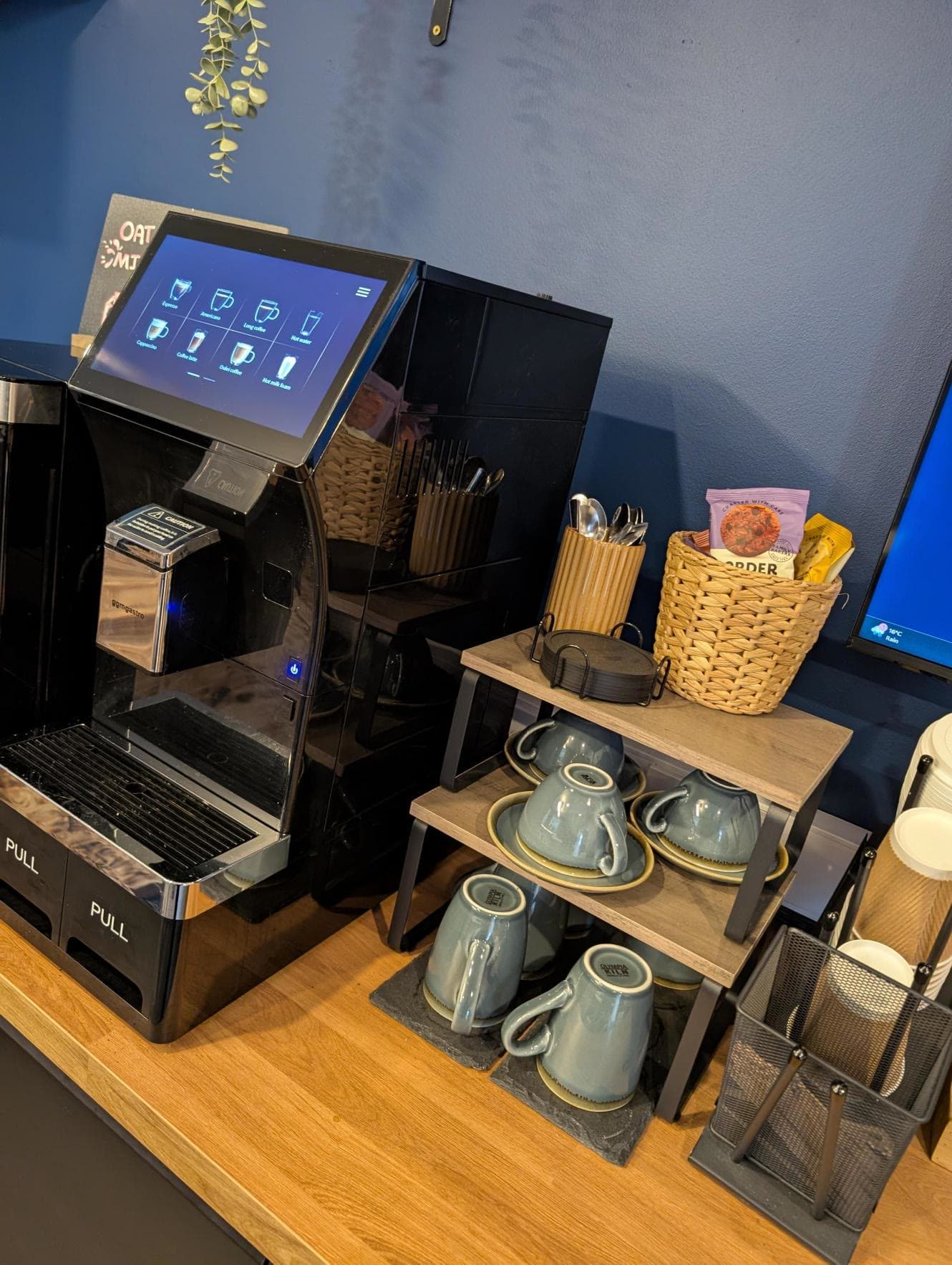 The bean-to-cup coffee machine and cups in the TTR reception